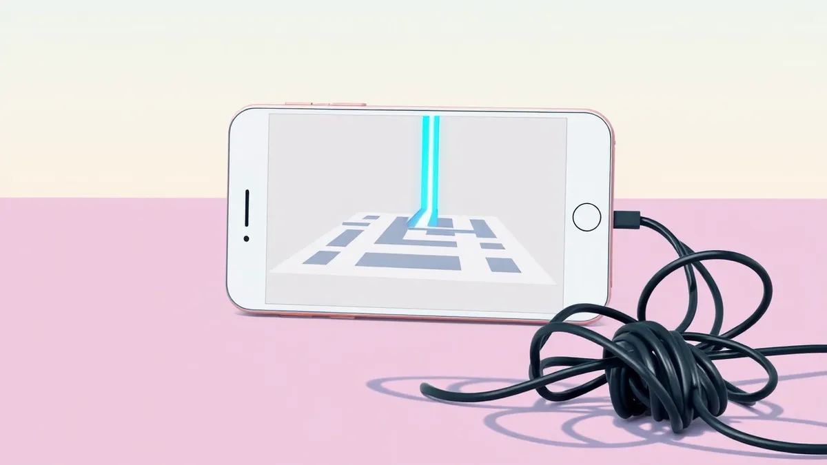 Illustration: A white smartphone sits on a desk with its screen displaying a simple geometric maze.